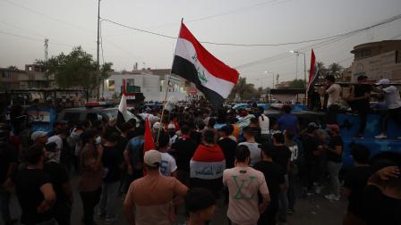 احتجاجات قرب السفارة التركية في بغداد، مساء الخميس (أحمد الربيعي/فرانس برس)