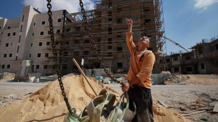 أعمال بناء في مستوطنات إسرائيلية/Getty