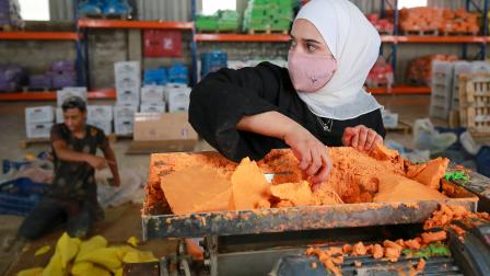 عمل المرأة الأردنية (خليل مزرعاوي/فرانس برس)