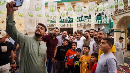الاستمتاع بالعيد جزء من حياة العراقيين وموروثهم (إسماعيل عدنان يعقوب/ الأناضول)