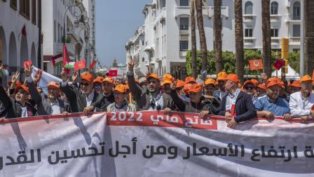تظاهرة عمالية بالرباط للمطالبة بتحسين الأجور، 1 مايو 2022/الأناضول 