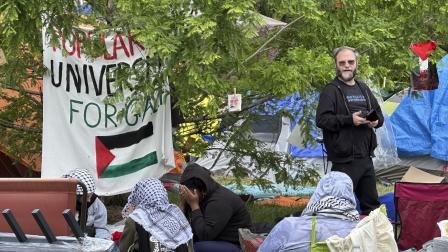 مخيم طلاب جامعة واين ستيت في ديترويت الأميركية تضامناً مع الفلسطينيين في غزة - 28 مايو 2024 (مايك هاوسهولدر/ أسوشييتد برس)