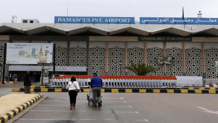 مطار دمشق الدولي (لؤي بشارة/فرانس برس)