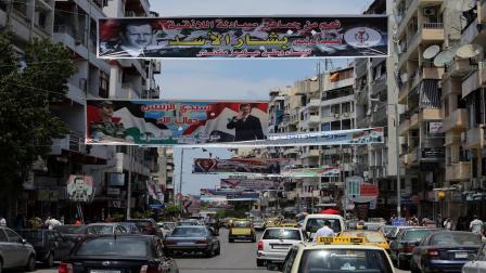 سورية/ اللاذقية/ ملصقات دعم لبشار الأسد (Getty)