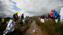 LLANWRTYD WELLS, WALES - AUGUST 28: A competitor snorkles as crowds watch during the World Bog Snorkelling Championships on August 28, 2011 in Llanwrtyd Wells, Wales. In 2012, following the Olympic Games, Llanwrtyd Wells will host the inaugural World Alternative Games. (Photo by Harry Engels/Getty Images)	