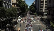 Aerial view of people queueing along Avenida de Mayo avenue to reach the Casa Rosada presidential palace to pay tribute to late Argentine football legend Diego Maradona in Buenos Aires in November 26, 2020. - Argentine football legend Diego Maradona will be buried Thursday on the outskirts of Buenos Aires, a spokesman said. Maradona, who died of a heart attack Wednesday at the age of 60, will be laid to rest in the Jardin de Paz cemetery, where his parents were also buried, Sebastian Sanchi told AFP. (Photo