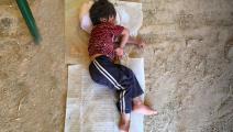 طفل نازح نائم - العراق - مجتمع - 11/2/2017