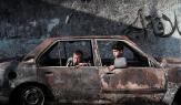 طفلان بسيارة تعرضت للقصف الإسرائيلي في رفح جنوبي غزة 28/2/2024 (فرانس برس)